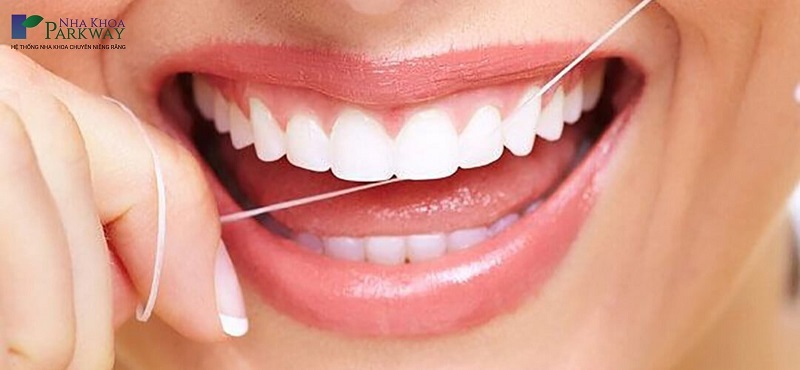 Vệ sinh răng miệng bằng chỉ nha khoa