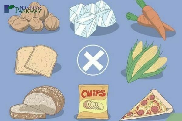 Những thực phẩm sau khi niềng răng cần kiêng: Đá lạnh, ngô, đồ ăn nhanh, cà rốt, bánh mì, hạt óc chó